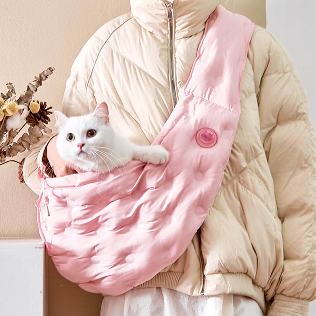 Person Carrying Cat in Pink Arkika Cat Sling Bag | MissyMoMo