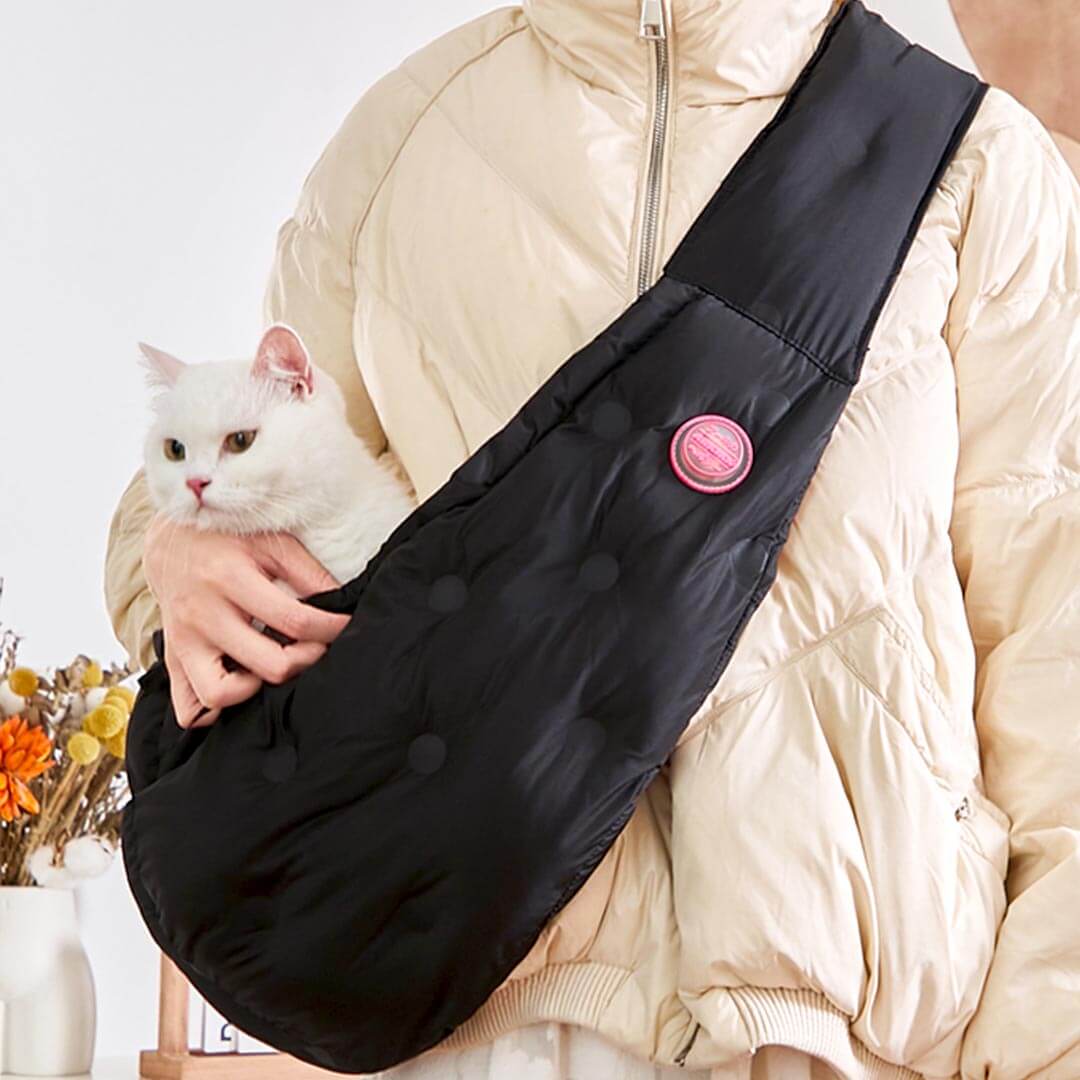 Person Carrying Cat in Black Arkika Cat Sling Bag | MissyMoMo